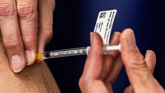 A nurse administers the AstraZeneca COVID-19 vaccine to a patient at the Austin Hospital in Melbourne on Wednesday. Picture: Getty Images