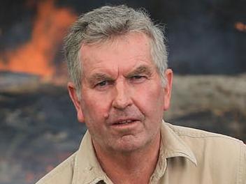 Nethercote Cattle Farmer Wayne Doyle wrote a letter to the premier warning of the bushfire risk in 2018. Pictured today with his dog Buddy at his property at 200 Ballantyne Rd Nethercote NSW.