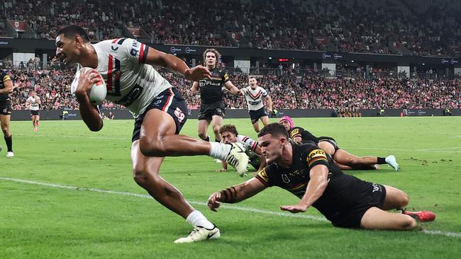 SYDNEY, AUSTRALIA - MARCH 14: DanielÃÂ Tupou of the Roosters scores a try during the round two NRL match between Penrith Panthers and Sydney Roosters at CommBank Stadium, on March 14, 2025, in Sydney, Australia. (Photo by Cameron Spencer/Getty Images)