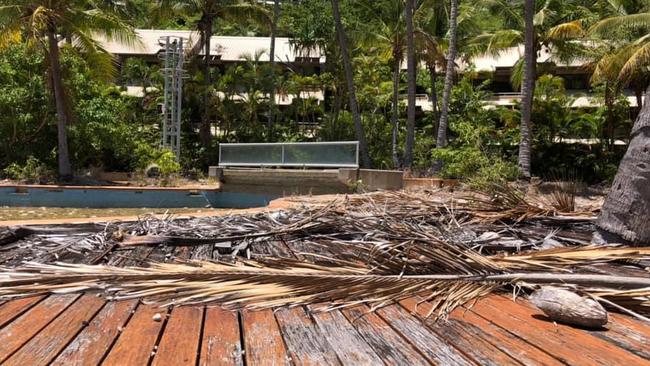 The resort on Lindeman Island is in a derelict state after it was abandoned following Cyclone Yasi in 2011. The new owner plans to redevelop the dilapidated Club Med. Picture: Red Livermore