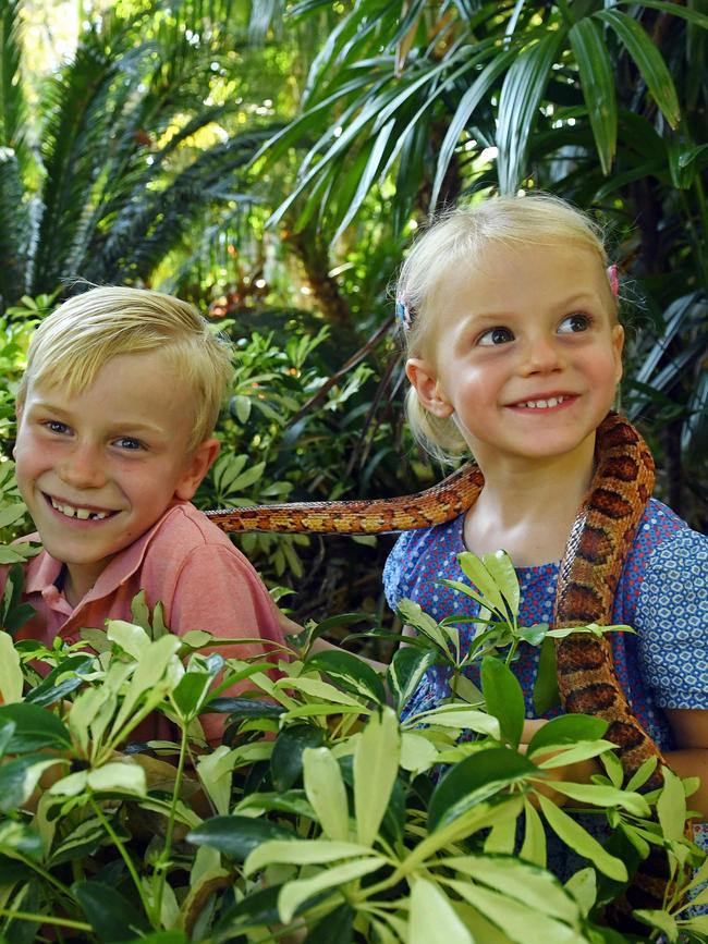 Eloise and Drew at the Adelaide Zoo with a snake. Picture: Tom Huntley