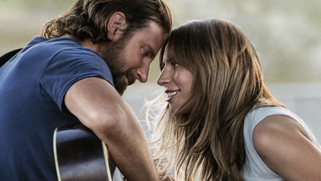 This image released by Warner Bros. Pictures shows Bradley Cooper, left, and Lady Gaga in a scene from 