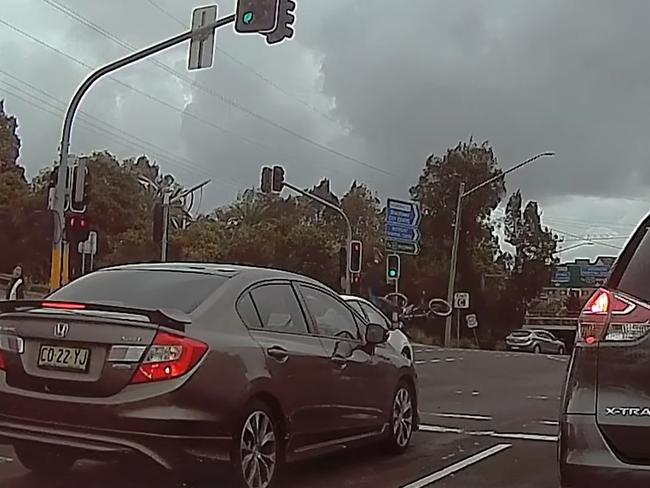 He was sent flying by a white sedan. Picture: Dashcam Owners Australia