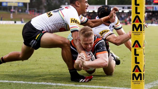 Reece Hoffman scores during the NRL trial match between the Penrith Panthers and the Wests Tigers in February. Picture: David Neilson/Getty Images