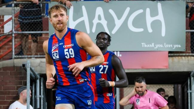Ex-Bomber Dyson Heppell runs out for Port Melbourne for a night match this season.