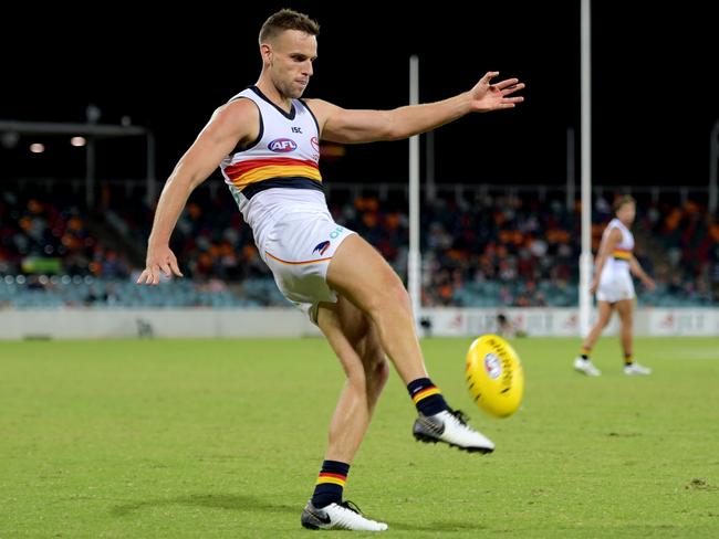 CANBERRA, AUSTRALIA - MARCH 08: Brodie Smith of the Crows  attempts a goal during the 2019 JLT Community Series AFL match between the Greater Western Sydney Giants and the Adelaide Crows at UNSW Canberra Oval on March 08, 2019 in Canberra, Australia. (Photo by Tracey Nearmy/Getty Images)