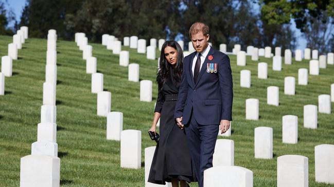 Prince Harry and Meghan have marked #RemembranceSunday by visiting the Los Angeles National Cemetery. Picture: Lee Morgan/ Twitter