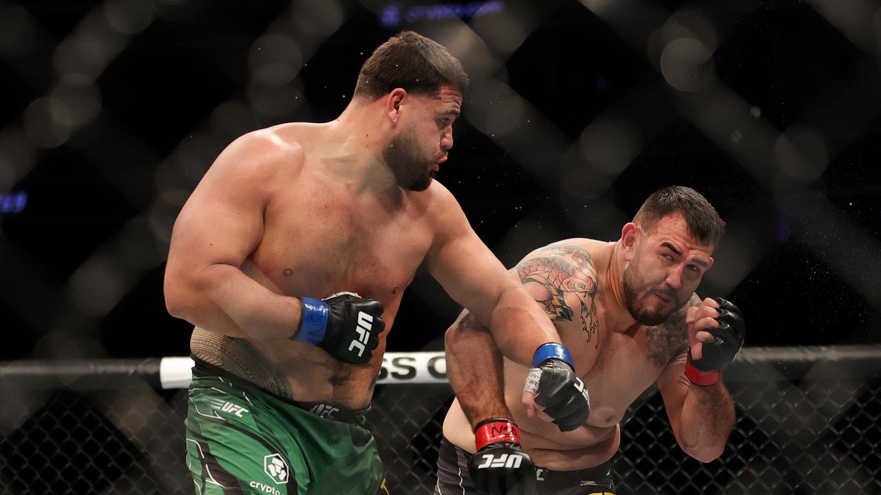 Tai Tuivasa exchanges with Augusto Sakai during UFC 269. Carmen Mandato/Getty Images/AFP