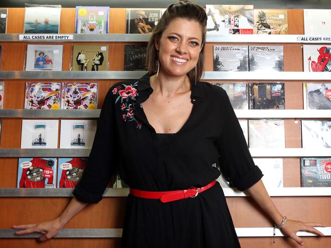 Amber Lawrence, pictured here at Hum on King Records in Newtown, will also perform at the carols. Picture: James Croucher