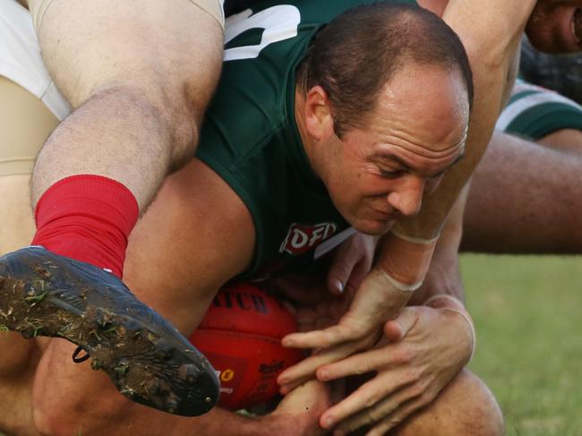 EDFL: Airport West’s Clayton Rogers locks in the ball. Picture: Stuart Milligan