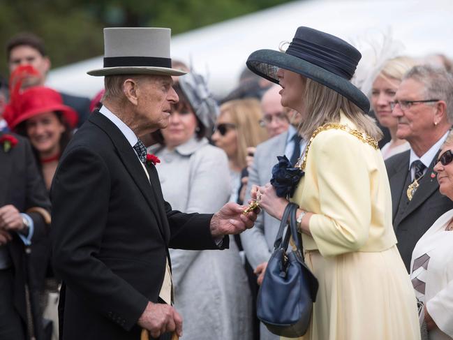 Britain’s Prince Philip, Duke of Edinburgh greets guests at a garden party at Buckingham Palace in London on May 16, 2017. Picture: AFP