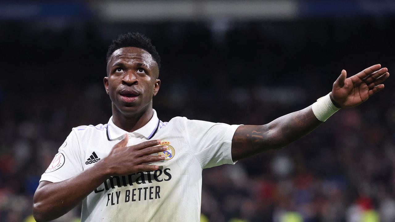 Real Madrid's Brazilian forward Vinicius Junior celebrates after scoring his team's third goal during the Copa del Rey (King's Cup), quarter final football match between Real Madrid CF and Club Atletico de Madrid at the Santiago Bernabeu stadium in Madrid on January 26, 2023. (Photo by Pierre-Philippe MARCOU / AFP)