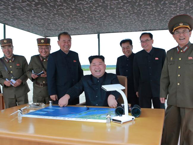 North Korean leader Kim Jong Un inspects a long and medium-range ballistic rocket launch drill in this undated photo released by North Korea's Korean Central News Agency in Pyongyang on August 30, 2017. Picture: KCNA/Reuters