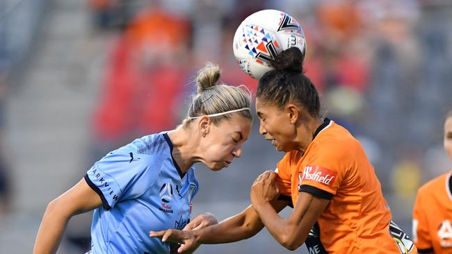 Alanna Kennedy puts her body on the line for Sydney FC against Roar’s Allira Toby.