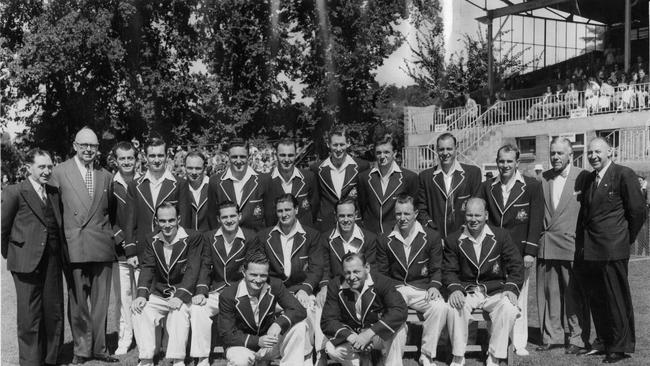 Portrait of the 1956 Australian Test cricket team. (Back l-r) team masseur Arthur James of Hobart, team manager Mr. W. J. Dowling, Ken Mackay, Jim Burke, John Rutherford, Alan Davidson, Peter Burge, Pat Crawford, Richie Benaud, Ron Archer, Colin McDonald, assistant manager Mr. W. L. Rush, team scorer-baggage man Mr. N. Gorman. (Middle l-r) Ian Craig, Neil Harvey, Keith Miller, Ian Johnson, Ray Lindwall, Gil Langley. (Front l-r) Len Maddocks and Jack Wilson. (Pic copyright Herald Sun Feature Service, Melbourne)