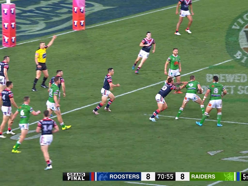 Referee Ben Cummins signalled six-again, before changing his mind in the 2019 grand final. The moment led to a controversial Roosters try.