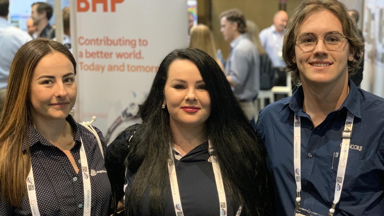 Anglo American's Danica Beavis (left) and Courtney O'Grady (centre) and Glencore's Ryan Bartlett at the Bowen Basin Symposium. Picture: Duncan Evans