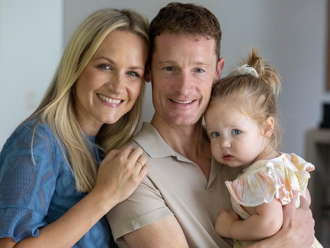 2022 Melbourne Cup-winning jockey Mark Zahra at at home for a V Weekend feature. Zahra with wife Elyse and baby Harper. Picture: Jason Edwards