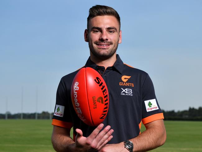 New captain Stephen Coniglio poses for a photo during a GWS Giants announcement at WestConnex Centre, in Sydney, Tuesday, December 3, 2019. (AAP Image/Joel Carrett) NO ARCHIVING