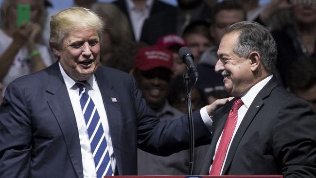 Donald Trump with Andrew Liveris in Grand Rapids, Michigan, in December 2016. Picture: AFP