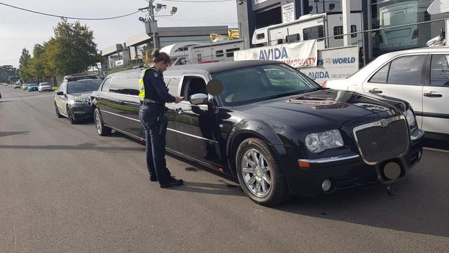 Police speak to an unregistered limousine driver with a suspended licence in Campbellfield.