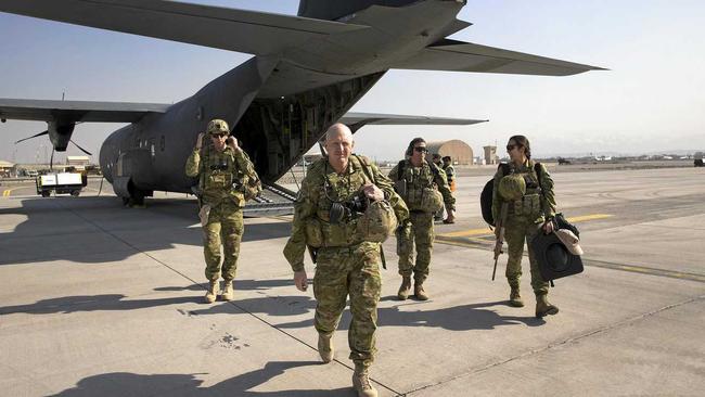 Commander Joint Task Force 633, Major General John Frewen, AM (second from right) arrives in Kabul, Afghanistan during a visit to meet with the troops. Sergeant Brad Wilson is second on the left. Picture: SGT Ricky Fuller