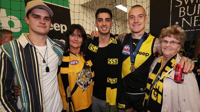 Norm Smith medallist Dustin Martin with his grandmother Lois Knight, mum Kathy and brothers Bronson and Tyson. Picture: Michael Klein.