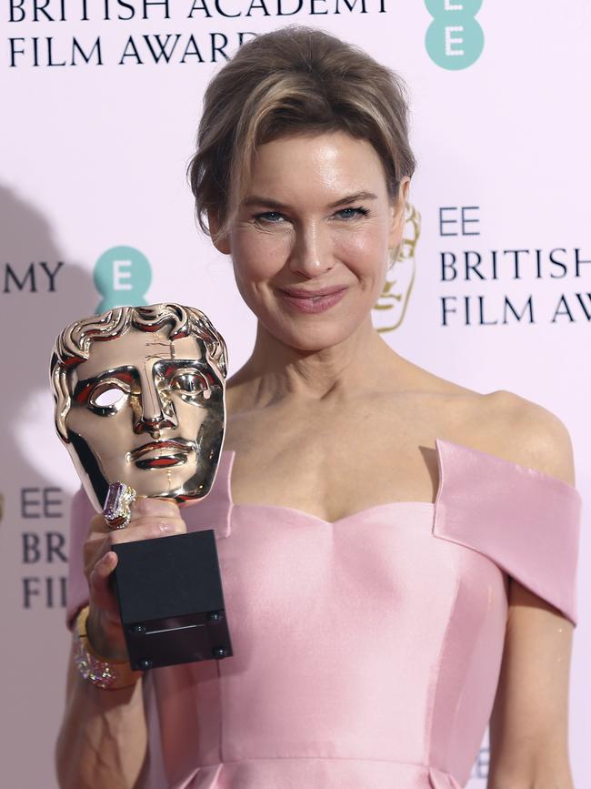 Actress Renee Zellweger poses with her award for Best Actress for Judy.