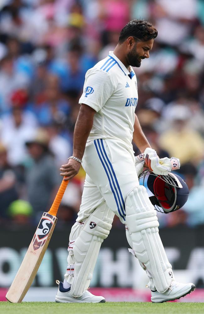 Rishabh Pant leaves the field after another brain snap. Picture: Getty Images