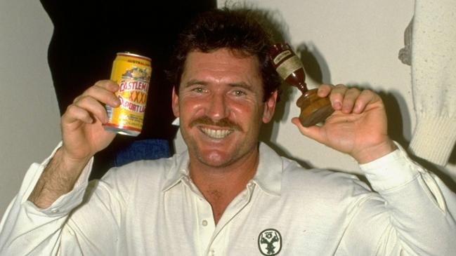 Jul 1989: Allan Border of Australia holds up the ashes in the dressing room after the Sixth Test against England at the Oval in London. The match ended in a draw. \ Mandatory Credit: Adrian Murrell/Allsport