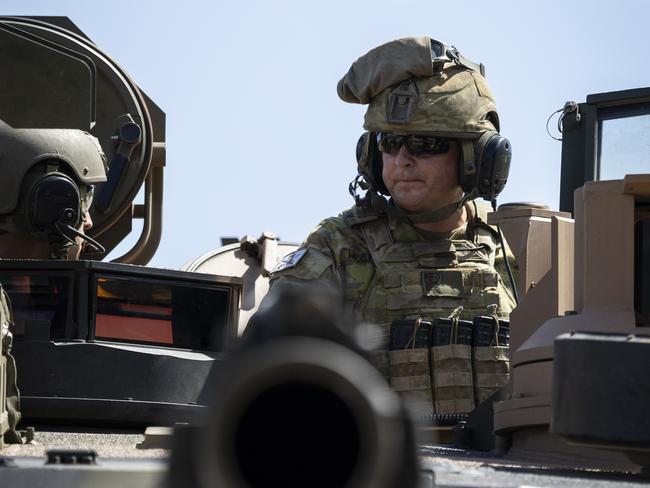 3rd Brigade Change of Command Ceremony at Lavarack Barracks. Australian Army officer Brigadier Dave McCammon, DSM and Bar, sits in a M1A2 System Enhanced Program v3 Main Battle Tank at Lavarack Barracks, Townsville, Queensland. Picture: Supplied