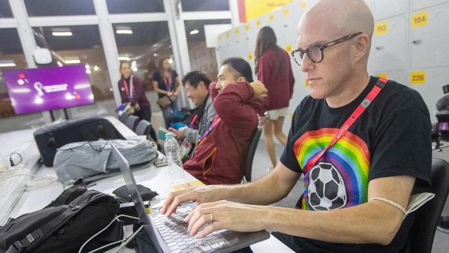 American journalist Grant Wahl covering the World Cup in Qatar. He passed away while reporting on the Argentina and Netherlands match.