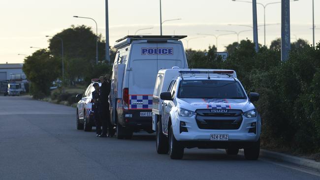 Police outside the crime scene area on Woolcock St Service Rd. Picture: Natasha Emeck