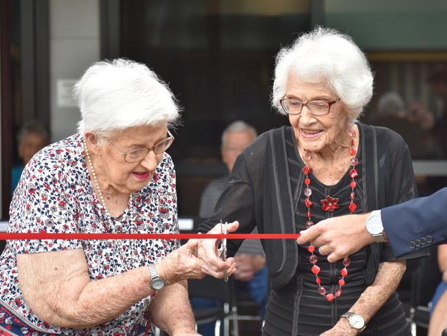 With a combined age of 209, residents Doreen Sheehan and Win Jefferies had the honour of cutting the ribbon to officially open the Waratah Wing at Dougherty Villa in Grafton.