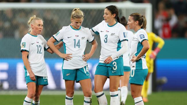 New Zealand players console each other after the draw. Picture: Lars Baron/Getty