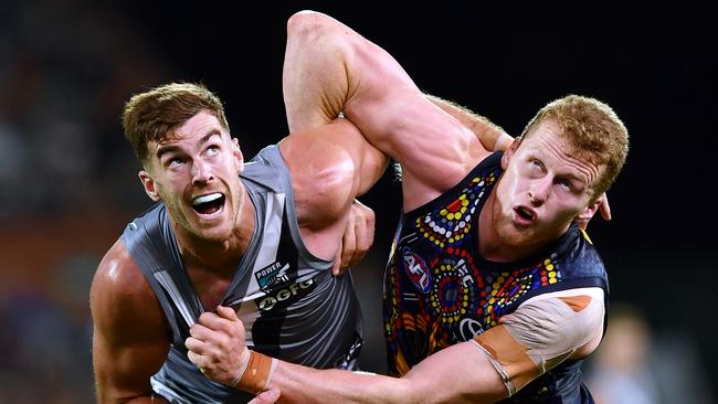 Port ruckman Scott Lycett gets tangled up with Adelaide’s Reilly O'Brien. Picture: Mark Brake/Getty Images