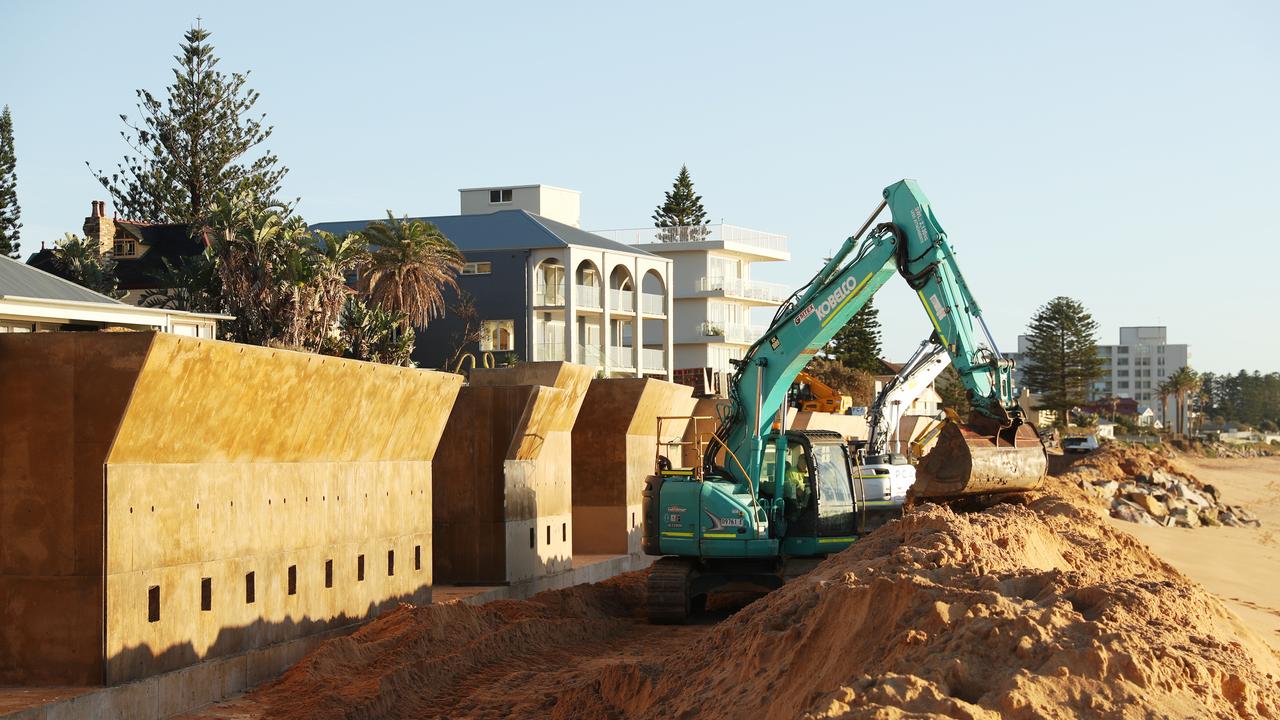 ‘We didn’t want it’: Wall divides beach town