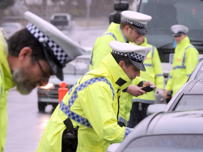 SA Police during random breath test for drug and drunk driving drivers on the Morphett Street Bridge in Adelaide.