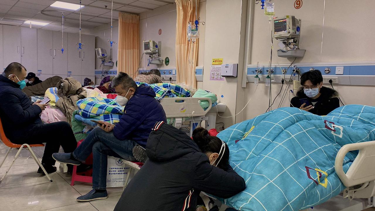 Patients with Covid-19 lay in beds at Tangshan Gongren Hospital as case numbers explode. Picture: Noel Celis/AFP