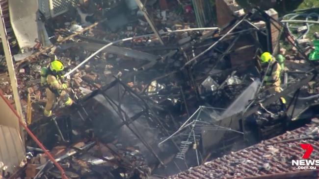 Eight fire trucks and more than 30 firefighters battled the blazing remnants of the garage for 40 minutes. Picture: 7 NEWS