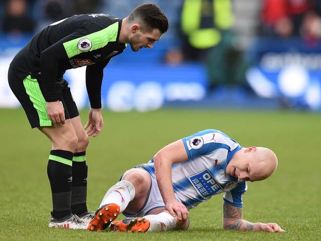 Aaron Mooy suffered a nasty leg gash.