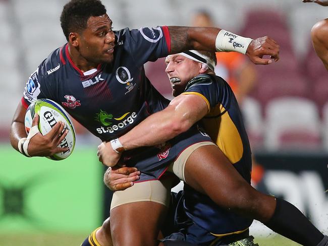 BRISBANE, AUSTRALIA - FEBRUARY 12: Samu Kerevi of the Reds is tackled by David Pocock of the Brumbies during the Super Rugby Pre-Season match between the Reds and the Brumbies at Ballymore Stadium on February 12, 2016 in Brisbane, Australia. (Photo by Chris Hyde/Getty Images)