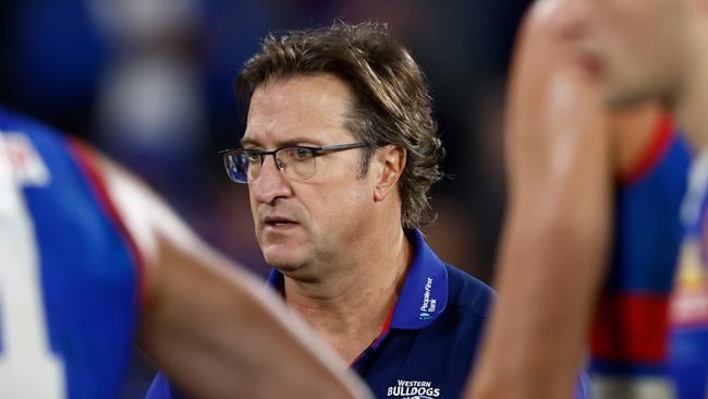 MELBOURNE, AUSTRALIA - AUG 18: Luke Beveridge, Senior Coach of the Bulldogs addresses his players during the 2024 AFL Round 23 match between the Western Bulldogs and the North Melbourne Kangaroos at Marvel Stadium on August 18, 2024 in Melbourne, Australia. (Photo by Michael Willson/AFL Photos via Getty Images)