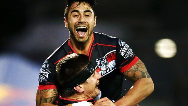 Shaun Johnson celebrates teammate Jacob Lillyman's try. Picture: Getty Images