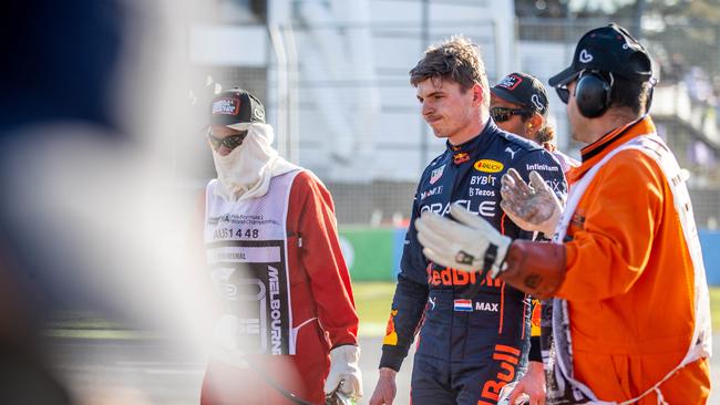 A downcast Max Verstappen comes to grips with his early retirement from the Australian Grand Prix. Picture: Jake Nowakowski