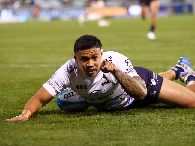 Len Ikitau celebrates after scoring a try against the Crusaders. Picture: Getty