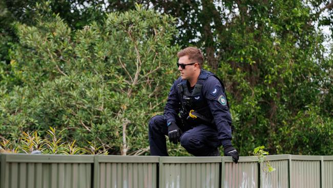 Police surround an address where they were hoping to arrest a high risk offender in West Kempsey. Picture: Max Mason-Hubers