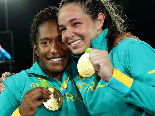 Ellia Green and Chloe Dalton celebrate winning the 2016 Rio Olympic Women's Rugby Sevens gold medal game over New Zealand at Deodoro Stadium, Rio. Pics Adam Head