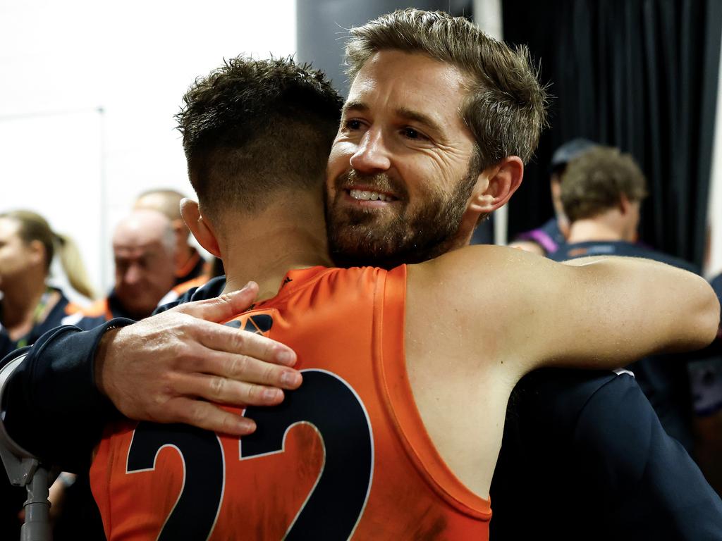 Josh Kelly hugs Callan Ward in the rooms. Picture: Brendon Thorne/AFL Photos
