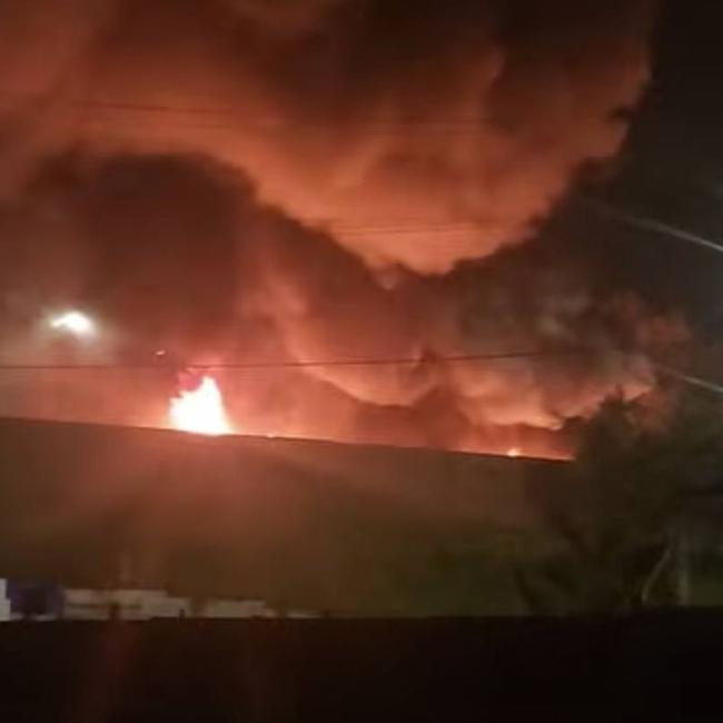 The burning truck on the Logan Motorway on Tuesday night (Facebook image)